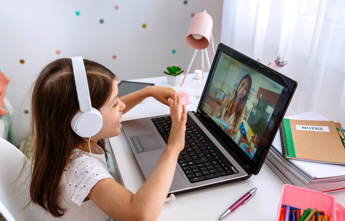 Little Girl in the Middle of Her Online Class