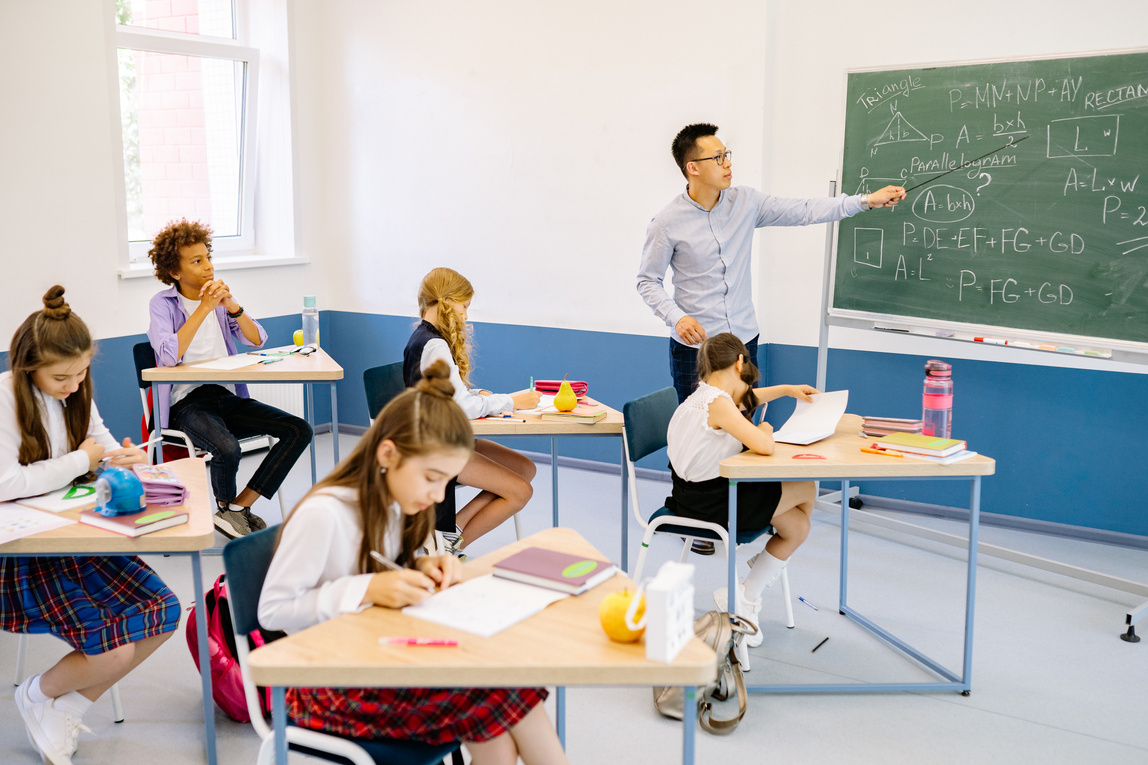 Male Teacher Discussing His Lesson About Mathematics